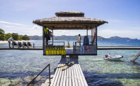 staff preparing all the watersports equipment