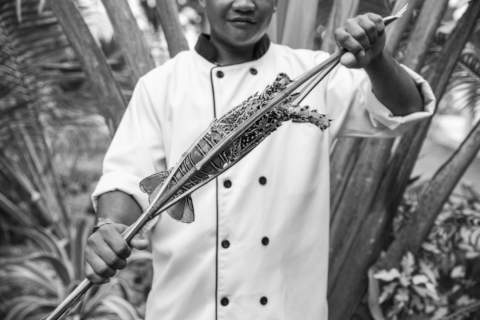 chef preparing lobster in traditional filipino style
