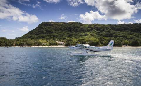 seaplane landed in front of island