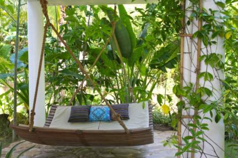 chillout bed hanging beneath villa