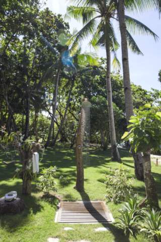 shower for the pool made from driftwood