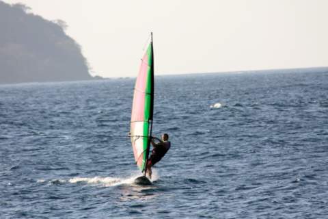 windsurfing between tropical islands